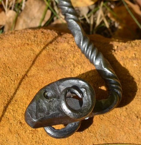 RAM'S HEAD, HAND-FORGED IRON CELTIC TORQUES