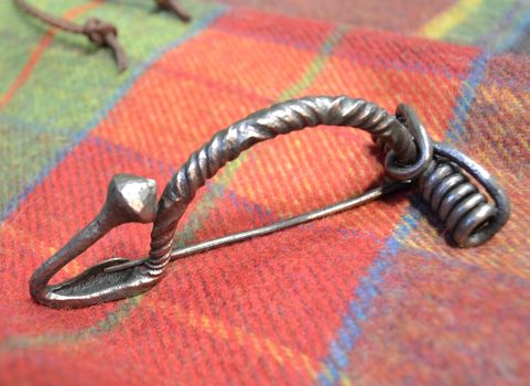 HAND FORGED CELTIC FIBULA WOTH A BALL