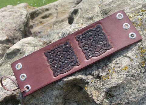 CARRAROE, LACED LEATHER CUFF, HAND CARVED