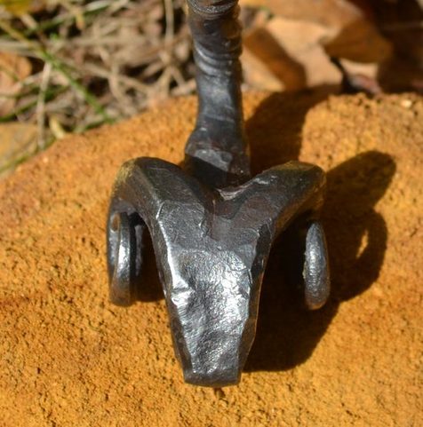 RAM'S HEAD, HAND-FORGED IRON CELTIC TORQUES