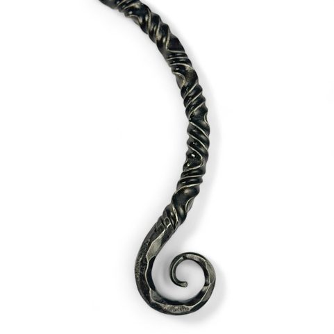 TWISTING IRON TORC