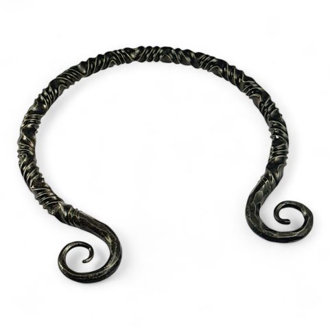 TWISTING IRON TORC