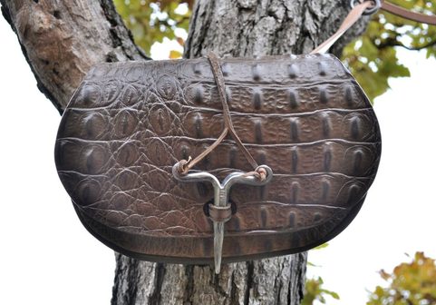 DRAGON SKIN, LEATHER BAG WITH FORGED NEEDLE