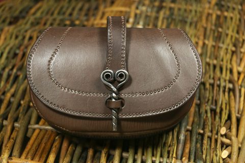 LEATHER BAG WITH FORGED NEEDLE