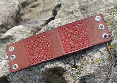 TULACH, LACED LEATHER CUFF, HAND CARVED