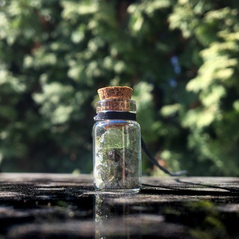 BOTTLE WITH MOLDAVITES, NECKLACE