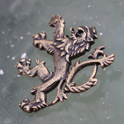 HERALDIC TWO-TAILED LION, PENDANT, BRASS PLATED