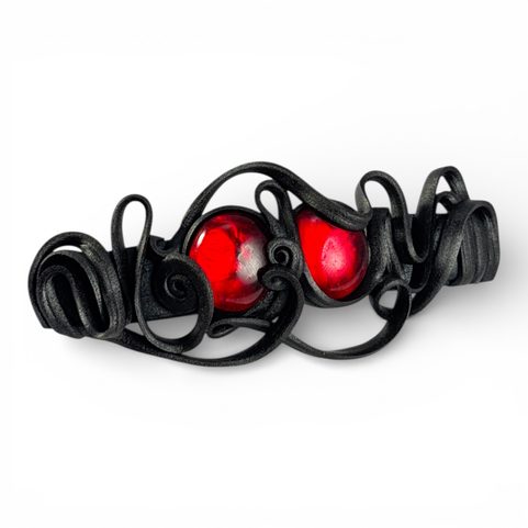 FERMOIR POUR CHEVEUX AUX YEUX ROUGES