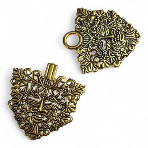 HOMME VERT, BROCHE POUR MANTEAU, BRONZE