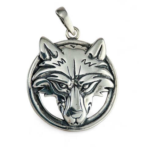 WOLF'S HEAD IN A RING, STERLING SILVER PENDANT
