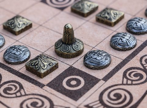 FIDCHELL, A CELTIC BOARD GAME VERSION CÚ CHULAINN WITH A LEATHER BOARD