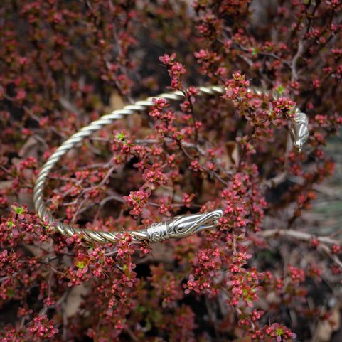 URNES STYLE BRASS TORQUES