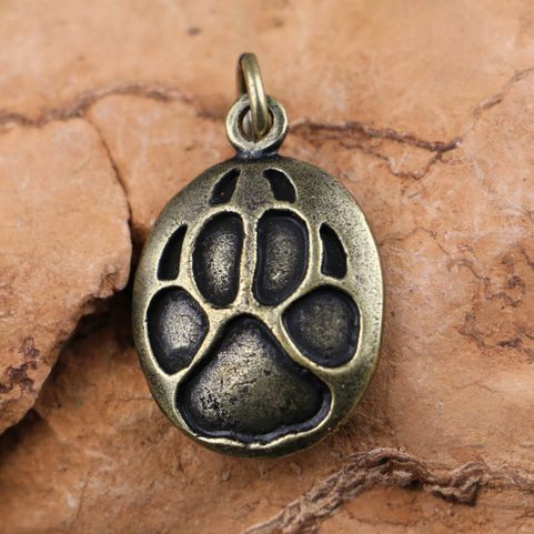 WOLF TRACK, PENDANT, ZINC, ANT. BRASS