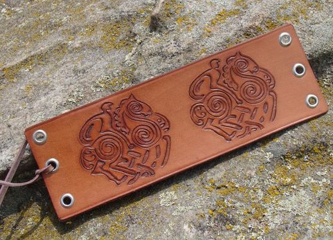 THE RIDER, LACED LEATHER CUFF, HAND CARVED