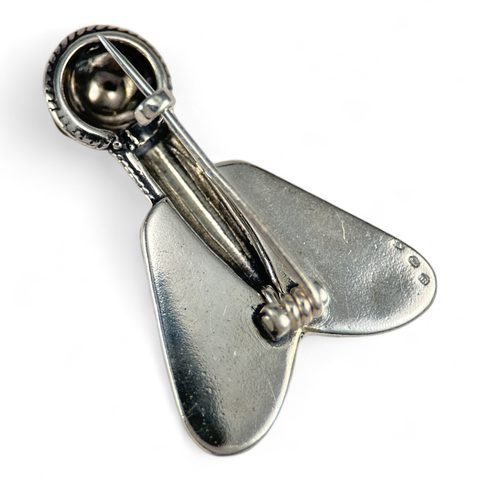 MEROVINGIAN SILVER AND GARNET CICADA BROOCH, 5TH CENTURY