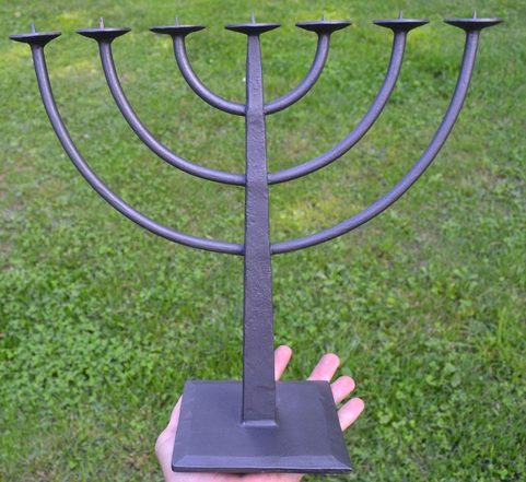 MENORAH, FORGED SEVEN-BRANCHED CANDLESTICK