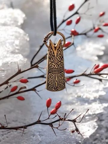 FISH-TAIL-SHAPED PENDANT WITH A RING, BRONZE
