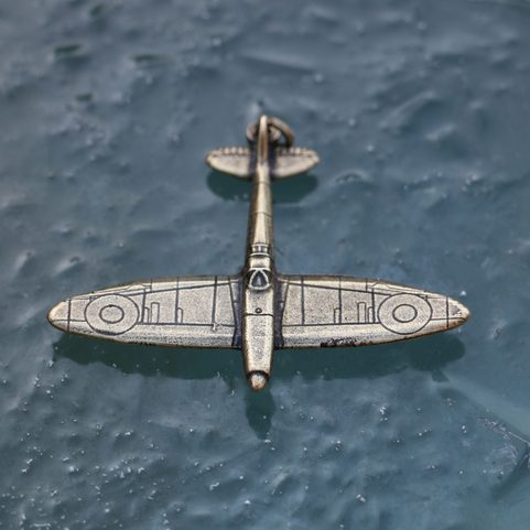 SUPERMARINE SPITFIRE, AIRCRAFT PENDANT, ANT.BRASS ZINC