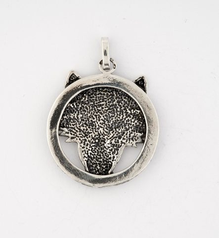 WOLF'S HEAD IN A RING, STERLING SILVER PENDANT