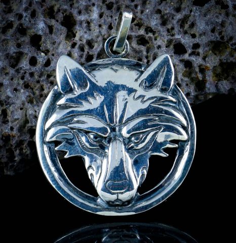 WOLF'S HEAD IN A RING, STERLING SILVER PENDANT