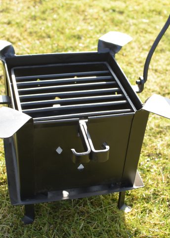 HISTORIC PORTABLE FIREPLACE AND GRILL MADE OF STEEL