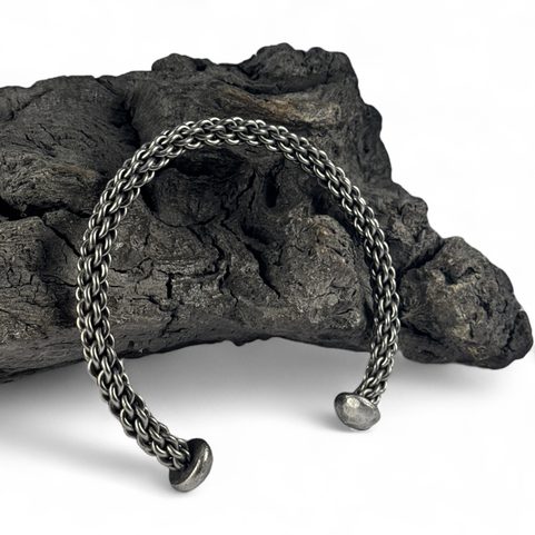 HAND FORGED AND BRAIDED STEEL TORC