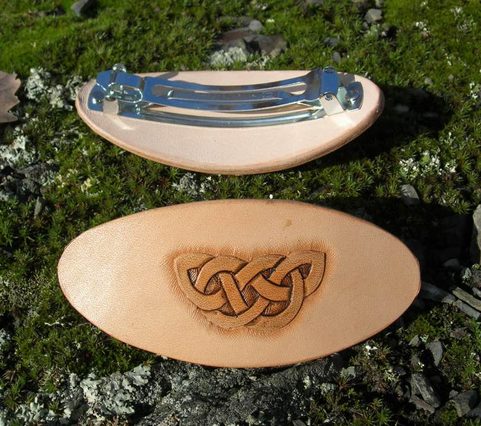 HAND CARVED LEATHER HAIR BROOCH III