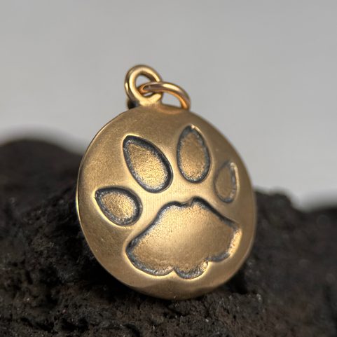 CAT TRACK, PENDANT, BRONZE