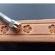 Petite fleur, cachet en cuir