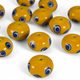 Celtic glass bead with eyes, yellow