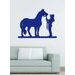 Dřevěný obrázek na stěně s koněm