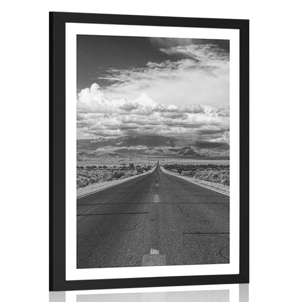 Levně Plakát s paspartou černobílá cesta v poušti