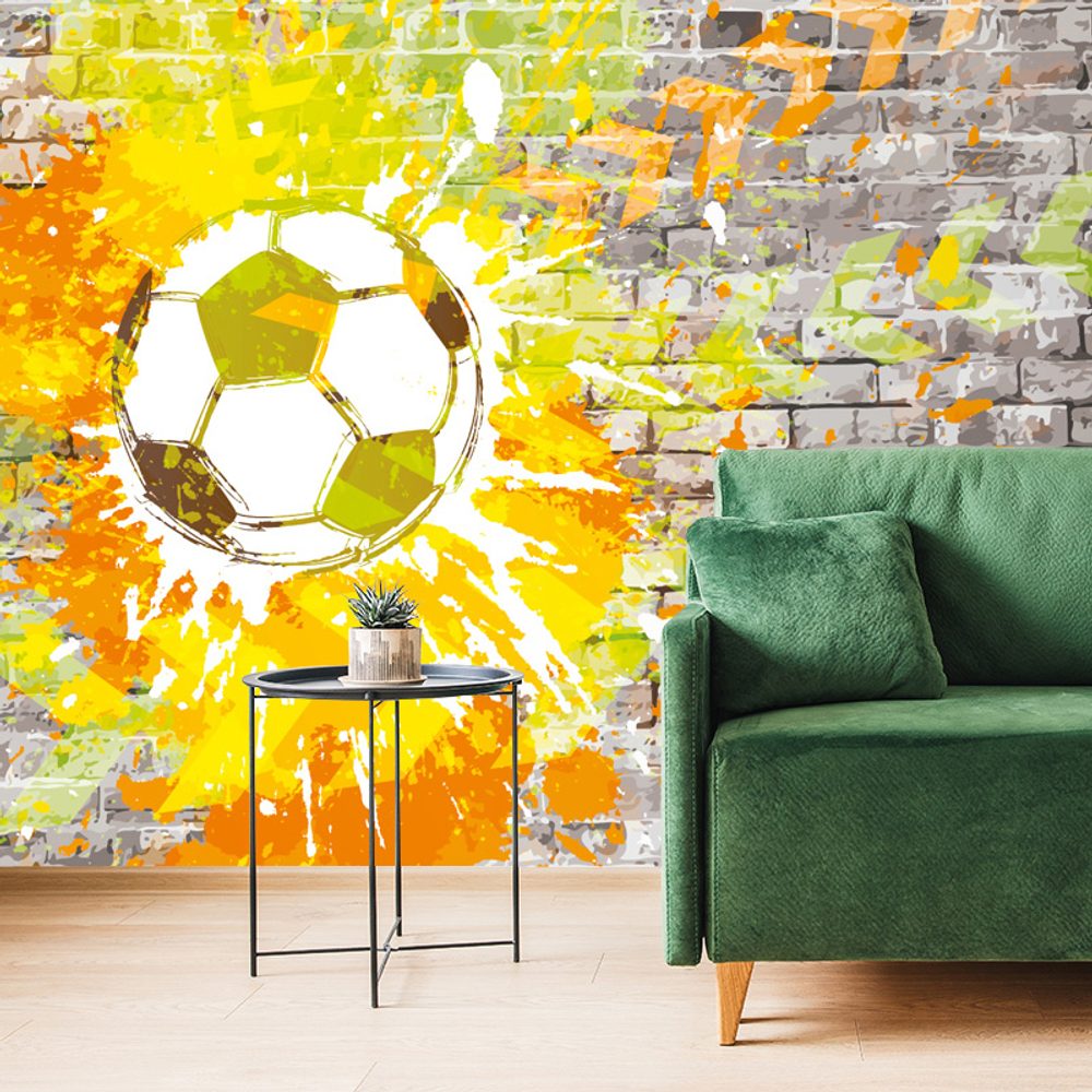 Tapeta futbalová lopta na tehlovej stene