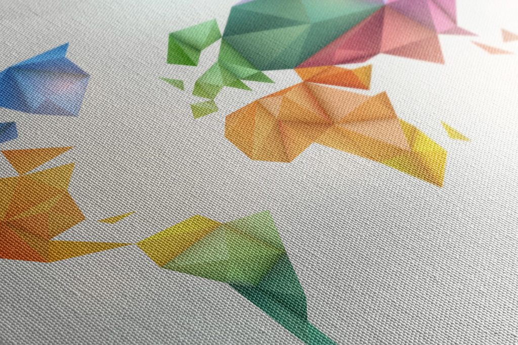 Tablou pe plută harta lumii colorată în stilul de origami | Dovido.ro