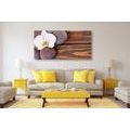 CANVAS PRINT WELLNESS STONES AND AN ORCHID ON A WOODEN BACKGROUND - PICTURES FENG SHUI - PICTURES