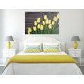 CANVAS PRINT CHARMING YELLOW TULIPS ON A WOODEN BACKGROUND - PICTURES FLOWERS - PICTURES