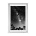 POSTER WITH MOUNT STARRY SKY ABOVE THE ROCKS IN BLACK AND WHITE - BLACK AND WHITE - POSTERS