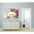 CANVAS PRINT WITH THE INSCRIPTION "LOVE" ON A STONE - PICTURES WITH INSCRIPTIONS AND QUOTES - PICTURES