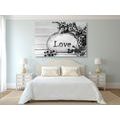 CANVAS PRINT WITH THE INSCRIPTION "LOVE" ON A STONE IN BLACK AND WHITE - BLACK AND WHITE PICTURES - PICTURES