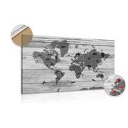 Picture on a cork black & white map on a wooden background