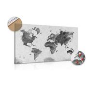 Picture on cork world map in retro style in black & white design