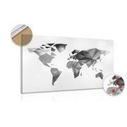 Picture on cork world map in origami style in black & white design