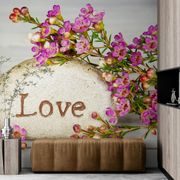 SELF ADHESIVE WALL MURAL WITH THE INSCRIPTION "LOVE" ON A STONE - SELF-ADHESIVE WALLPAPERS - WALLPAPERS