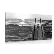 Canvas print refreshing drink on the beach in black and white