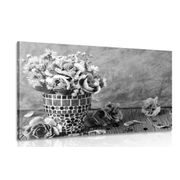 Picture of carnation flowers in a mosaic pot in black & white
