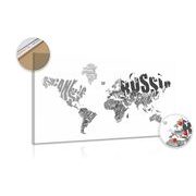 Tablou pe plută harta lumii din inscripții în design alb-negru