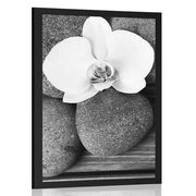 POSTER WELLNESS STONES AND AN ORCHID ON A WOODEN BACKGROUND IN BLACK AND WHITE - BLACK AND WHITE - POSTERS