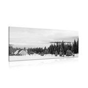 Canvas print cottage in snowy nature in black and white