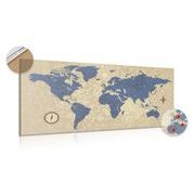 Picture on cork world map with compass in retro style