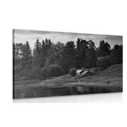 Canvas print fairytale cottages by the river in black and white